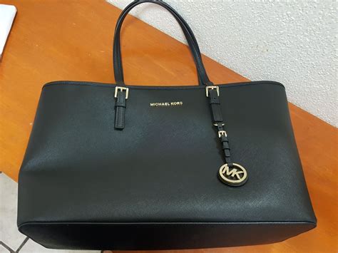 bolsa michael kors original negra|bolso de Michael Kors.